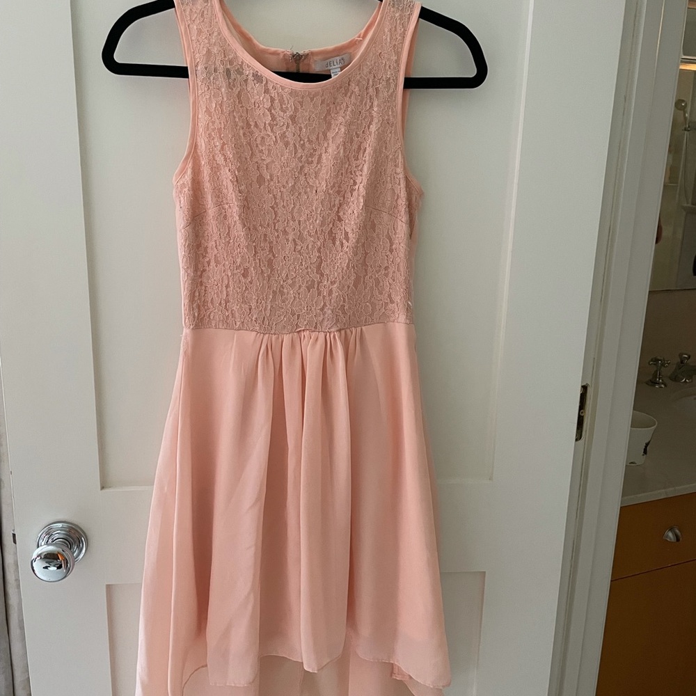 Pink dress with lace on top and longer train